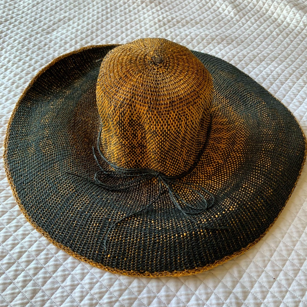 Black and straw hat with thin ribbon